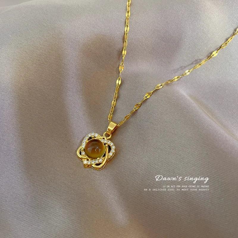 Colar pedra do humor - Coração entrelaçado cravejado - Banhado a ouro 18k